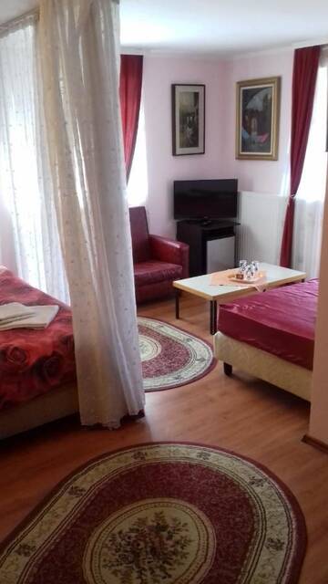 Фото номера Трехместный номер с видом на горы Проживание в семье Casa Ticino Predeal г. Предял 5