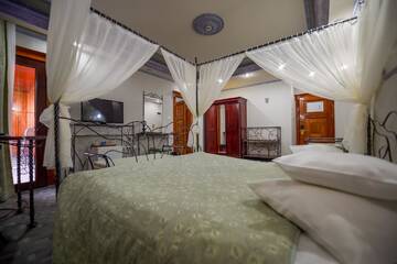 Фото номера Улучшенный двухместный номер с 1 кроватью Отель Predeal Comfort Suites г. Предял 4