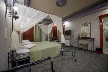 Фото номера Улучшенный двухместный номер с 1 кроватью Отель Predeal Comfort Suites г. Предял 6