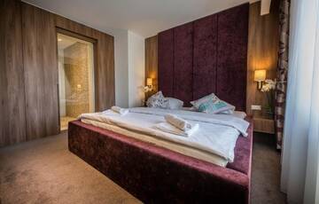 Фото номера Апартаменты Делюкс с камином и балконом Отель Eden Grand Resort г. Предял 6