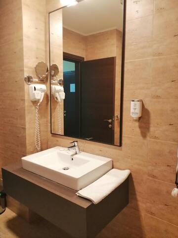 Фото номера Двухместный номер эконом-класса с 2 отдельными кроватями Отель Hotel Piemonte г. Предял 7